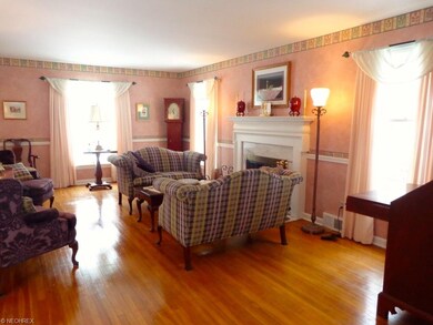To the left of the front door upon entry, is the s