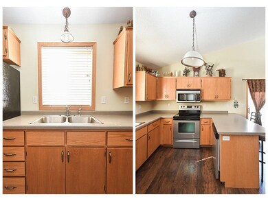 Main level kitchen overlooks the front yard, featu