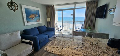 Living room with hardwood / wood-style floors and 