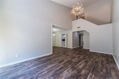Great Room Second Photo New Lighting, Flooring and