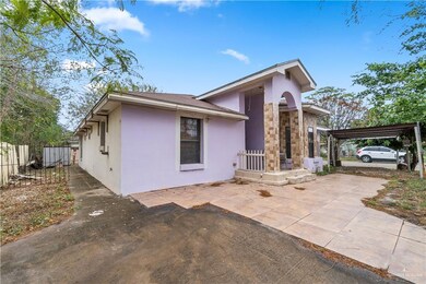 View of front of house with a patio