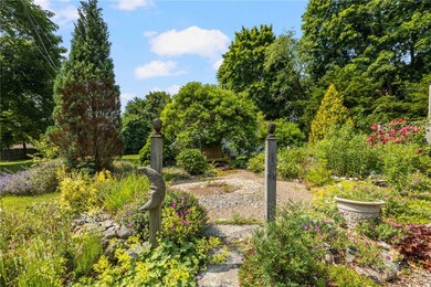 Exquisite, magical gardens envelop the property