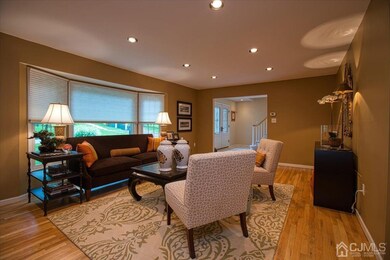 Beautiful bay window has custom pleated shades