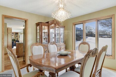 Formal dining room with serene mealtime views.