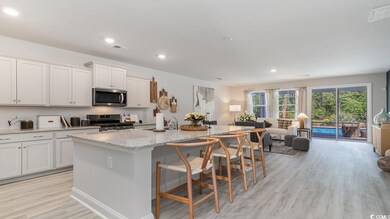 Kitchen with appliances with stainless steel finis