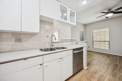 Kitchen opens to the dining area.