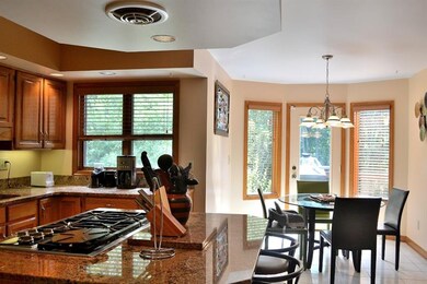 The large, naturally lighted breakfast area leads 