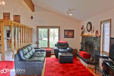 Living Area w Woodburning Fireplace
