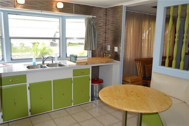 BRIGHT OPEN KITCHEN.