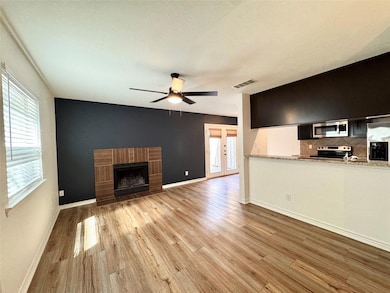 Unfurnished living room featuring light wood-styl