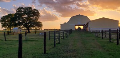 As the sun sets behind the barn, the day winds dow