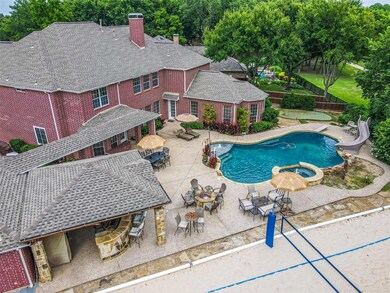 View of swimming pool featuring a patio and a wate