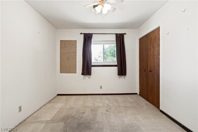 Bedroom #2 has ceiling fan with light.