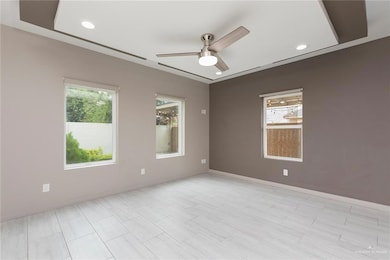 Spare room featuring ceiling fan and recessed lighting