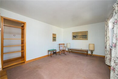 Living room  - 15x11 with large picture window for natural light.