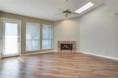 Fireplace and skylights in the living area.