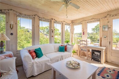 Bright & airy sunroom feels private