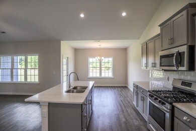 Kitchen with appliances with stainless steel finis