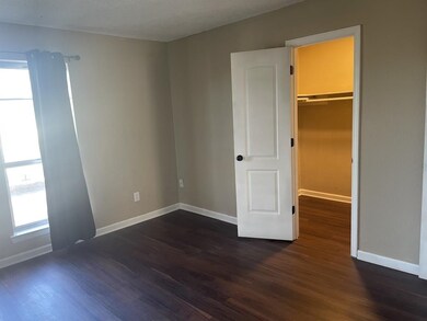 Unfurnished bedroom featuring a walk in closet, da