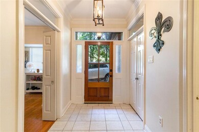 FOYER ENTRY, NEXT TO DINING AND OFFICE OR FOURTH B