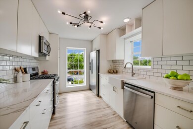Kitchen featuring stainless steel appliances, a c