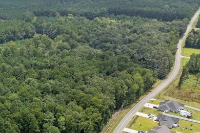 Drone / aerial view of a heavily wooded area