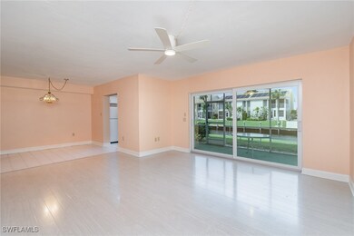 Living room looking towards kitchen and dining are