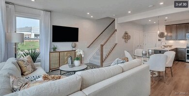 Living room with stairs, wood finished floors, rec