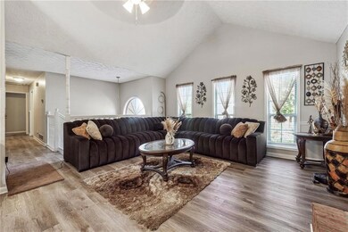 Living room featuring plenty of natural light, woo