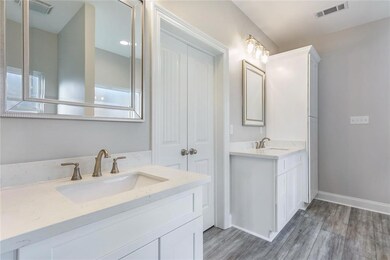 His and her own vanities with Quartz countertop an