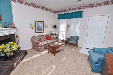 Step inside and be greeted by the living room feat