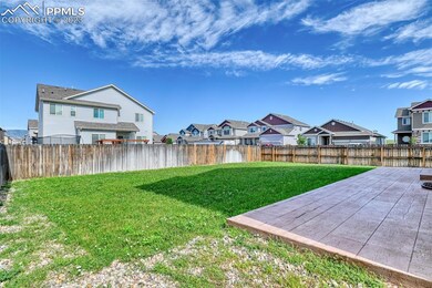 Level, spacious fenced yard with upgraded concrete