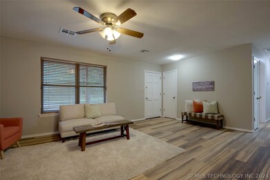 Front door and coat closet to the right of the front door.