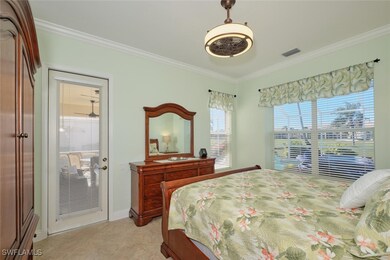 Bedroom featuring ornamental molding and baseboard