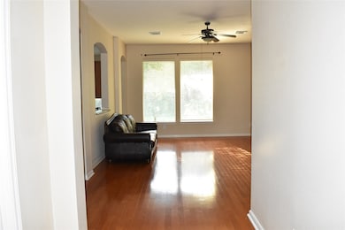 Wood floor throughout. Entry to living Room.