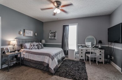 Spacious guest bedroom on main level with access to a full guest bath. There is new flooring in all the bedrooms. (Photo from previous listing with permission).