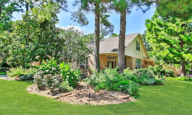 Relish the expansive corner lot with lush landscap