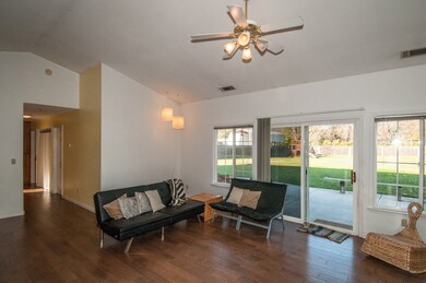 living room with vaulted ceilings