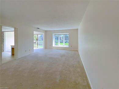 GREAT ROOM TO KITCHEN AND DINNING ROOM.