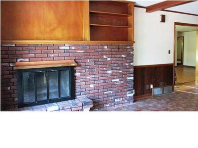 Family room with brick fireplace