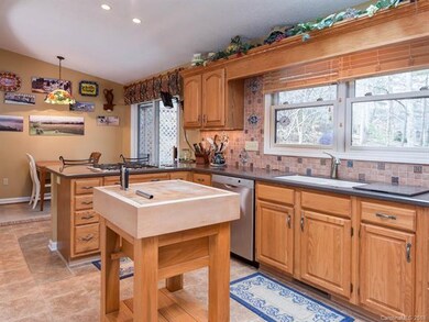 Updated kitchen with access to the back deck and f