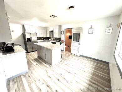 110 NW 3rd St, Checotah, OK 74426 - photo 4