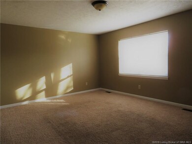 Spacious living room with lots of natural light.