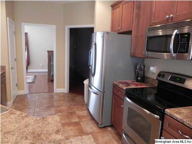 ANOTHER VIEW OF THE KITCHEN