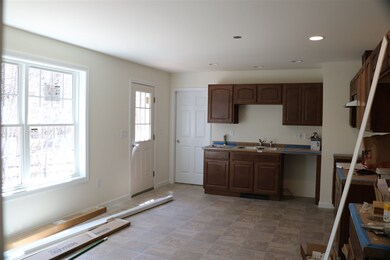 Open sunny kitchen with dining space