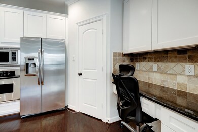 The 2nd floor kitchen boasts a large walk-in pantr