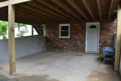Lower Patio & Entrance to Bsmt