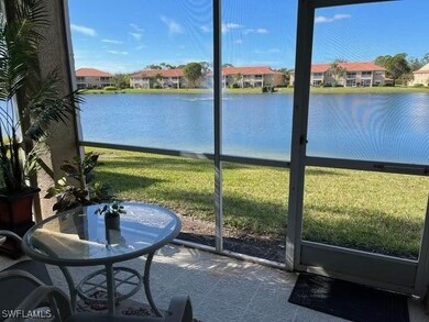 Sunroom / solarium with a water view