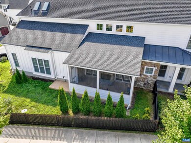 Enjoy the outdoors on the cozy screened porch with