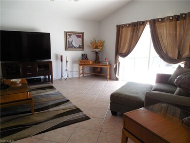 Right side of living room with slider to the lanai